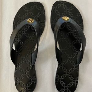 Tory Burch black leather flip flops.  Size 10